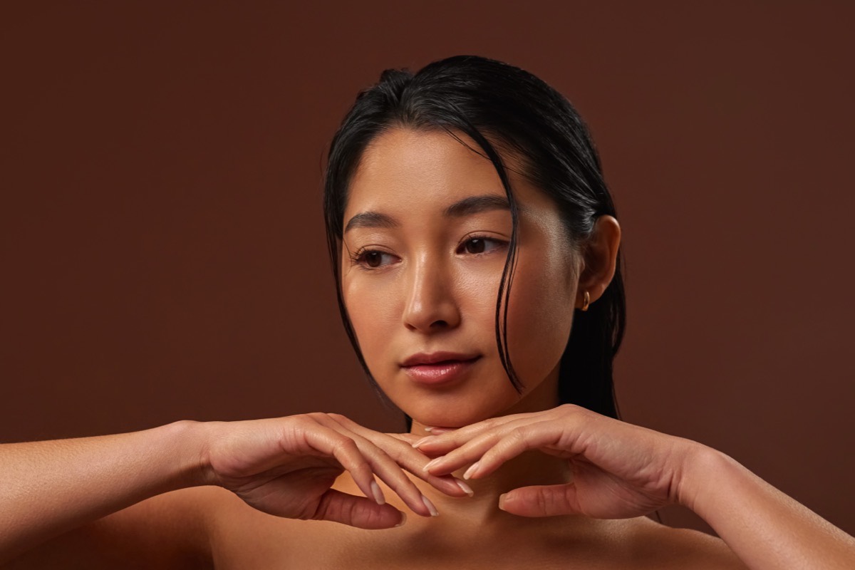 Woman with a dewy, glass-skin glow