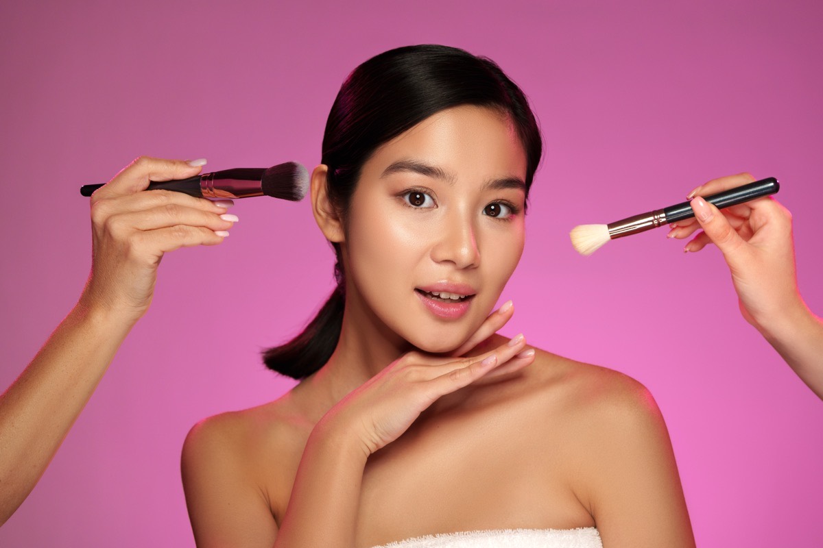 Applying makeup over a smooth sunscreen base
