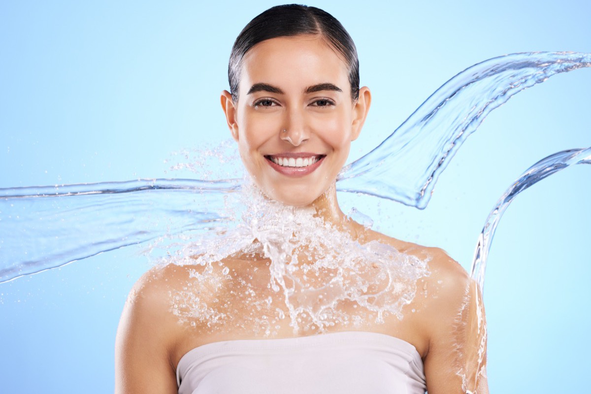 Water splashing over freshly cleansed skin
