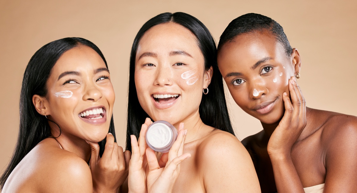 Friends comparing hydrating face creams